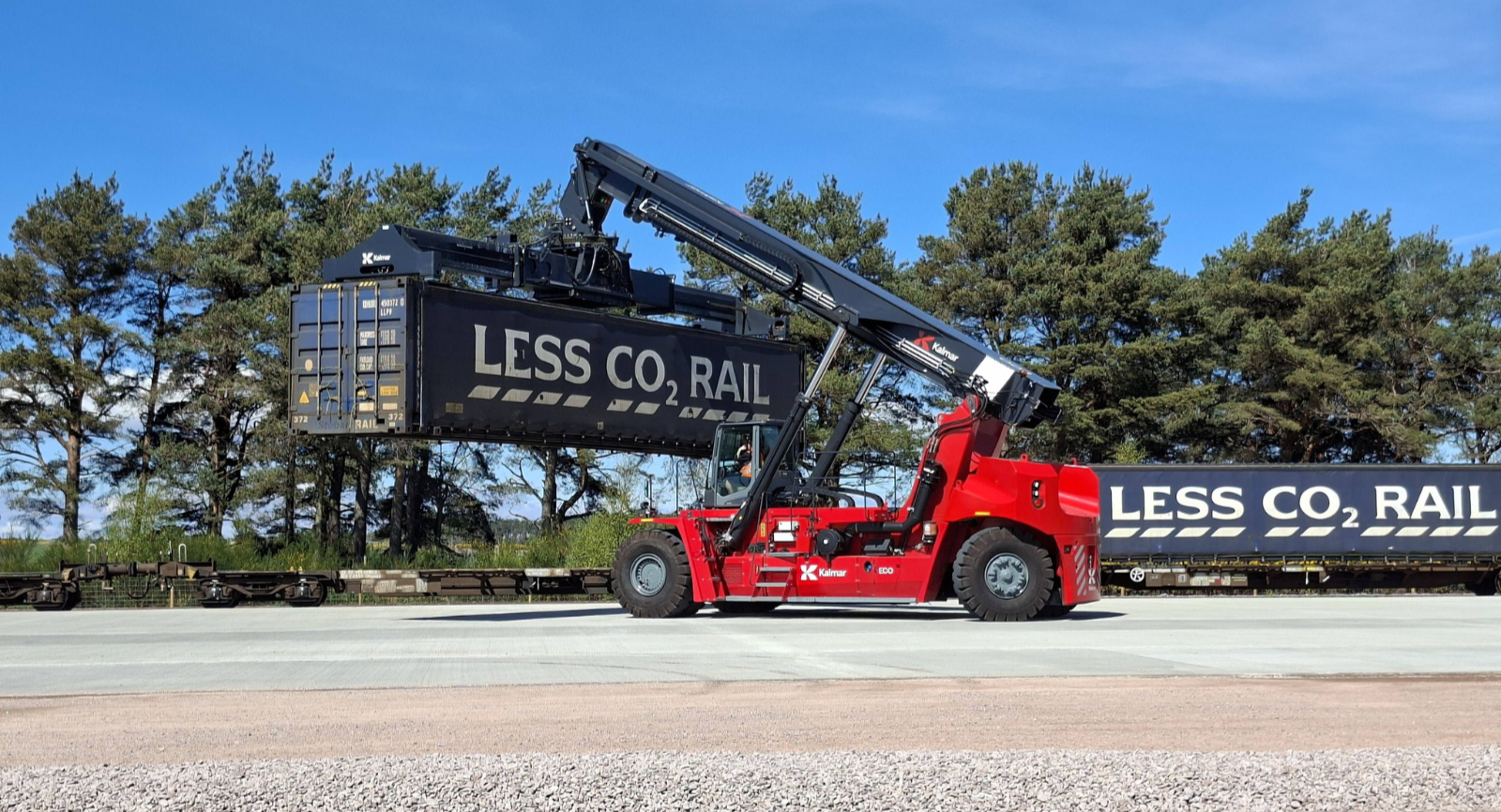 The reach stacker gets to work